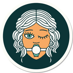 tattoo style sticker of winking female face with ball gag