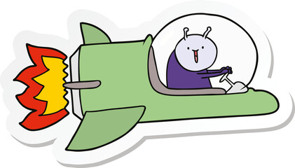sticker of a cartoon alien in spaceship