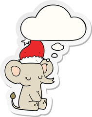 cute christmas elephant and thought bubble as a printed sticker