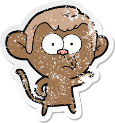 distressed sticker of a cartoon hooting monkey