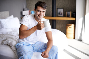 Man, bedroom and morning coffee portrait and smile, weekend off in apartment to relax with...