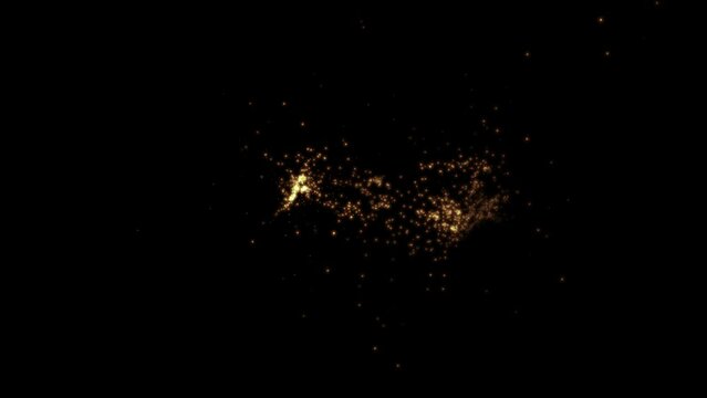golden light particles floating on black background