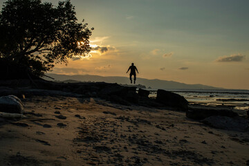 Silhouette of a young man