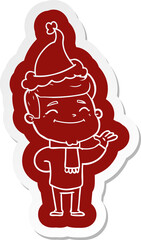 happy cartoon  sticker of a man wearing santa hat