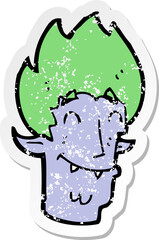 retro distressed sticker of a cartoon happy vampire head