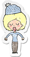 retro distressed sticker of a cartoon woman wearing winter hat