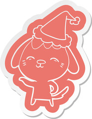 happy cartoon  sticker of a dog wearing santa hat