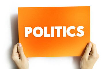 Politics is the set of activities that are associated with making decisions in groups, or other forms of power relations among individuals, text concept on card