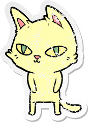 distressed sticker of a cartoon cat with bright eyes