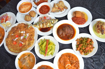 popular yummy indonesia spicy malay halal food menu curry chicken, rendang beef, asap fish, fried vegetable, begedil potato, chilli sambal achar, egg cuisine for restaurant dining