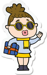 sticker of a cartoon woman wearing sunglasses