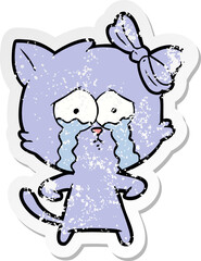 distressed sticker of a cartoon cat