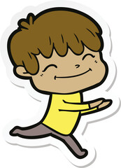 sticker of a cartoon happy boy