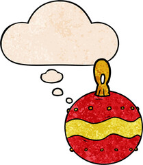 cartoon christmas bauble and thought bubble in grunge texture pattern style