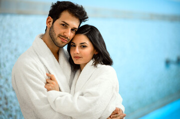 Couple embracing in spa setting
