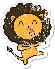 distressed sticker of a happy cartoon lion