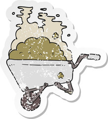 retro distressed sticker of a cartoon wheelbarrow full of dirt