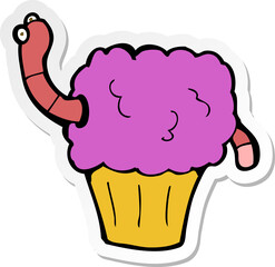 sticker of a cartoon worm in cupcake