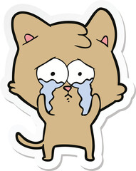 sticker of a cartoon crying cat