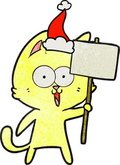funny textured cartoon of a cat with sign wearing santa hat