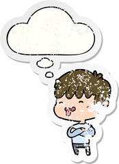 cartoon boy sticking out tongue and thought bubble as a distressed worn sticker