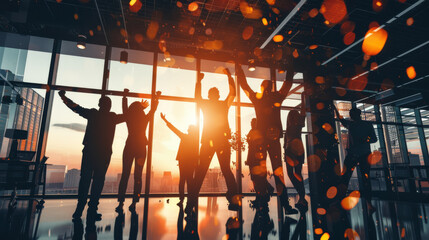 Businessman celebrating success in office