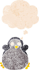 cartoon penguin and thought bubble in retro textured style