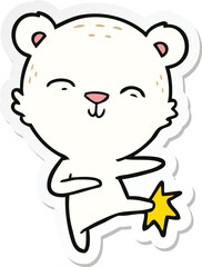 sticker of a happy cartoon polar bear kicking