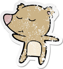 distressed sticker of a happy cartoon bear