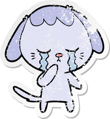 distressed sticker of a cartoon crying dog