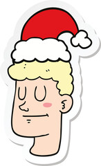 sticker of a cartoon man wearing christmas hat