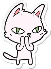 sticker of a cartoon cat staring