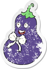 retro distressed sticker of a cartoon eggplant
