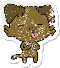 distressed sticker of a cartoon dog sticking out tongue