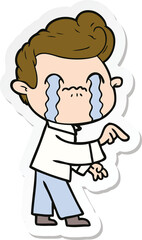 sticker of a cartoon man crying