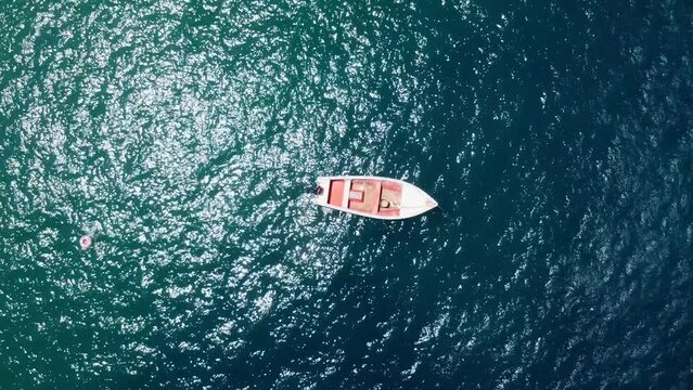 boat in the sea from a zenithal drone view