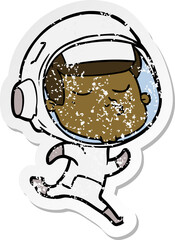 distressed sticker of a cartoon confident astronaut