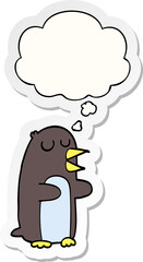 cartoon penguin and thought bubble as a printed sticker