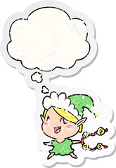 cartoon happy christmas elf and thought bubble as a distressed worn sticker
