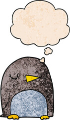 cartoon penguin and thought bubble in grunge texture pattern style