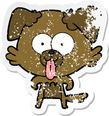 distressed sticker of a cartoon dog with tongue sticking out
