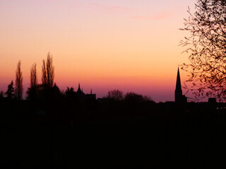 Beautiful Sunset in Rostock Riekdahl, view of the church 