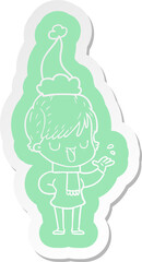 cartoon  sticker of a woman talking wearing santa hat