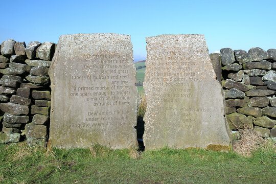 Keighley, UK 03 04 2024 A Stanza Stone poem called DEW by the poet laureate Simon Armitage has been carved into rock plinths and placed between two drystone walls in the Yorkshire landscape
