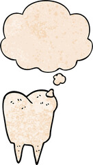 cartoon tooth and thought bubble in grunge texture pattern style