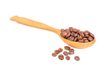 Coffee beans in a spoon isolate