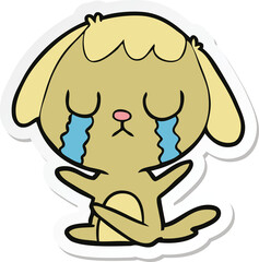 sticker of a cute cartoon dog crying
