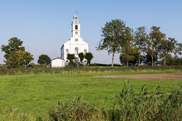 The little white church of Simonshaven on Voorne-Putten in the southwest of The Netherlands