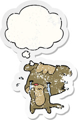 cartoon sad dog and thought bubble as a distressed worn sticker