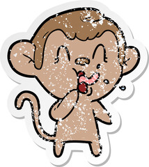 distressed sticker of a crazy cartoon monkey